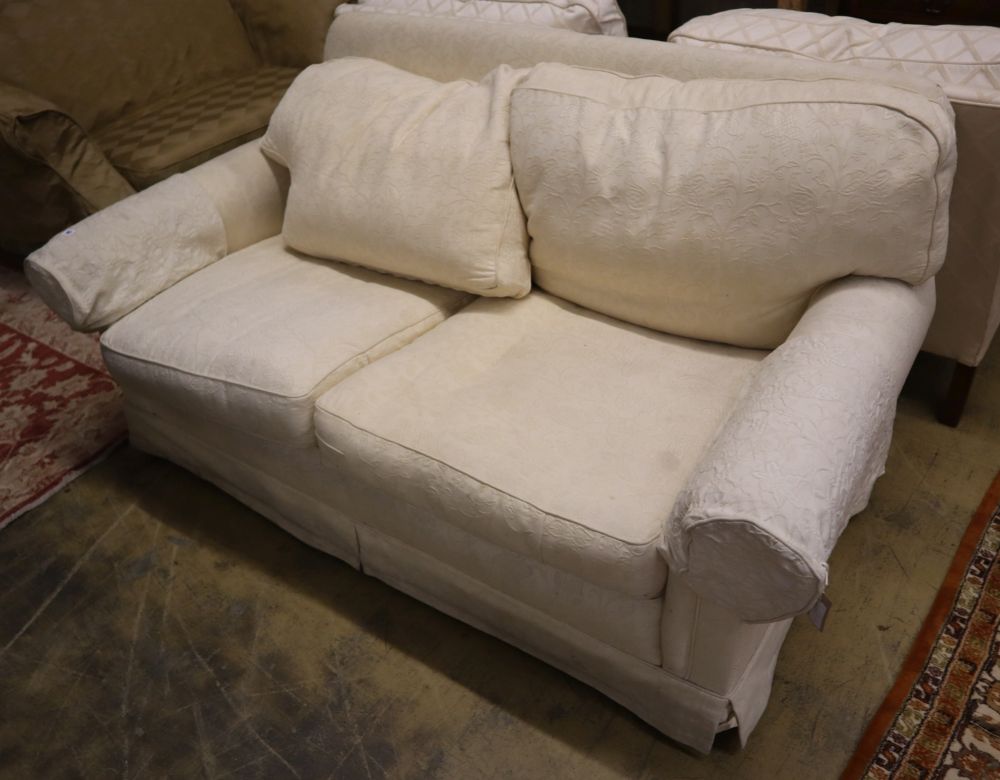 A contemporary cream brocade upholstered two seater settee, width 170cm depth 92cm height 86cm